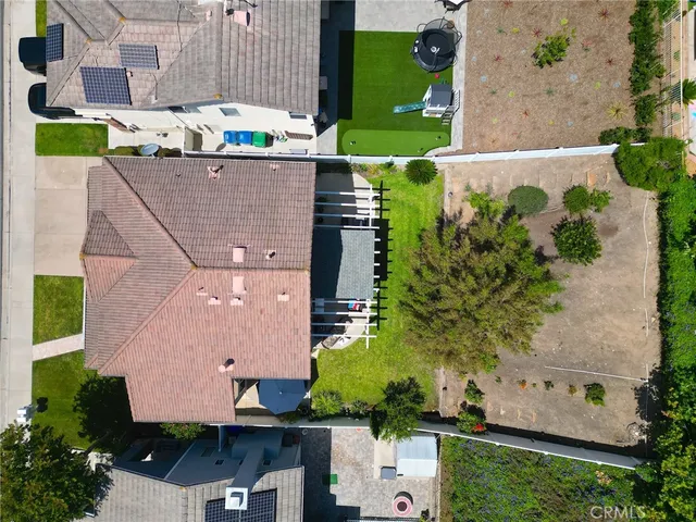 an aerial view of multiple houses with outdoor space