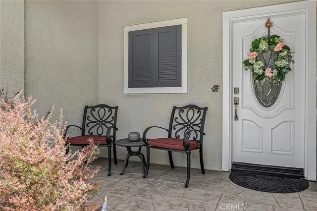a view of a entryway with furniture and front door
