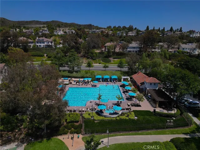 an aerial view of a house with a garden