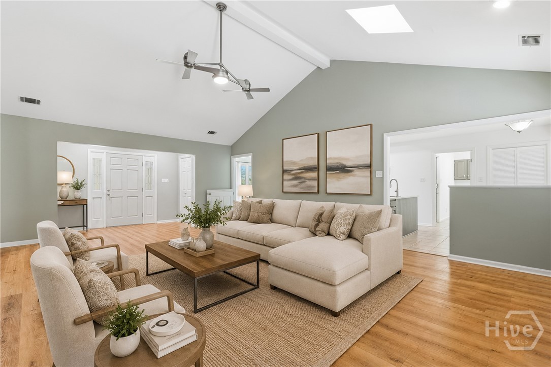 3 Rice Mill Drive Savannah, GA 31419 - Photo 5 of 37 Great room is spacious and light-filled and flows into the adjacent dining room, backyard deck and kitchen with breakfast nook. *image has been digitally enchanced.