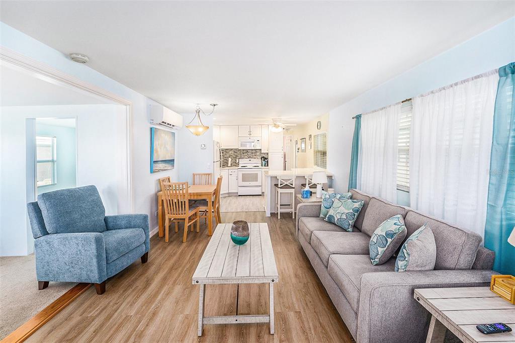 34527 Violet Drive Pinellas Park, FL 33781 - Photo 2 of 27 a living room with furniture and a couch