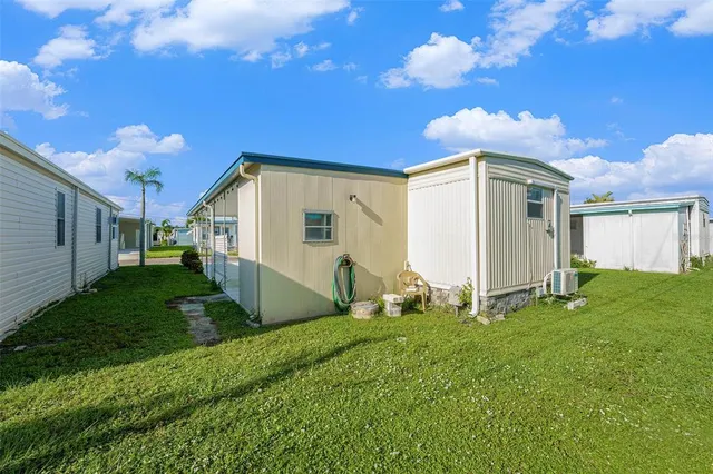 a view of a back yard of the house