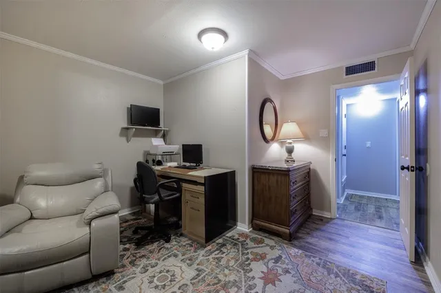 a bathroom with a toilet sink and shower