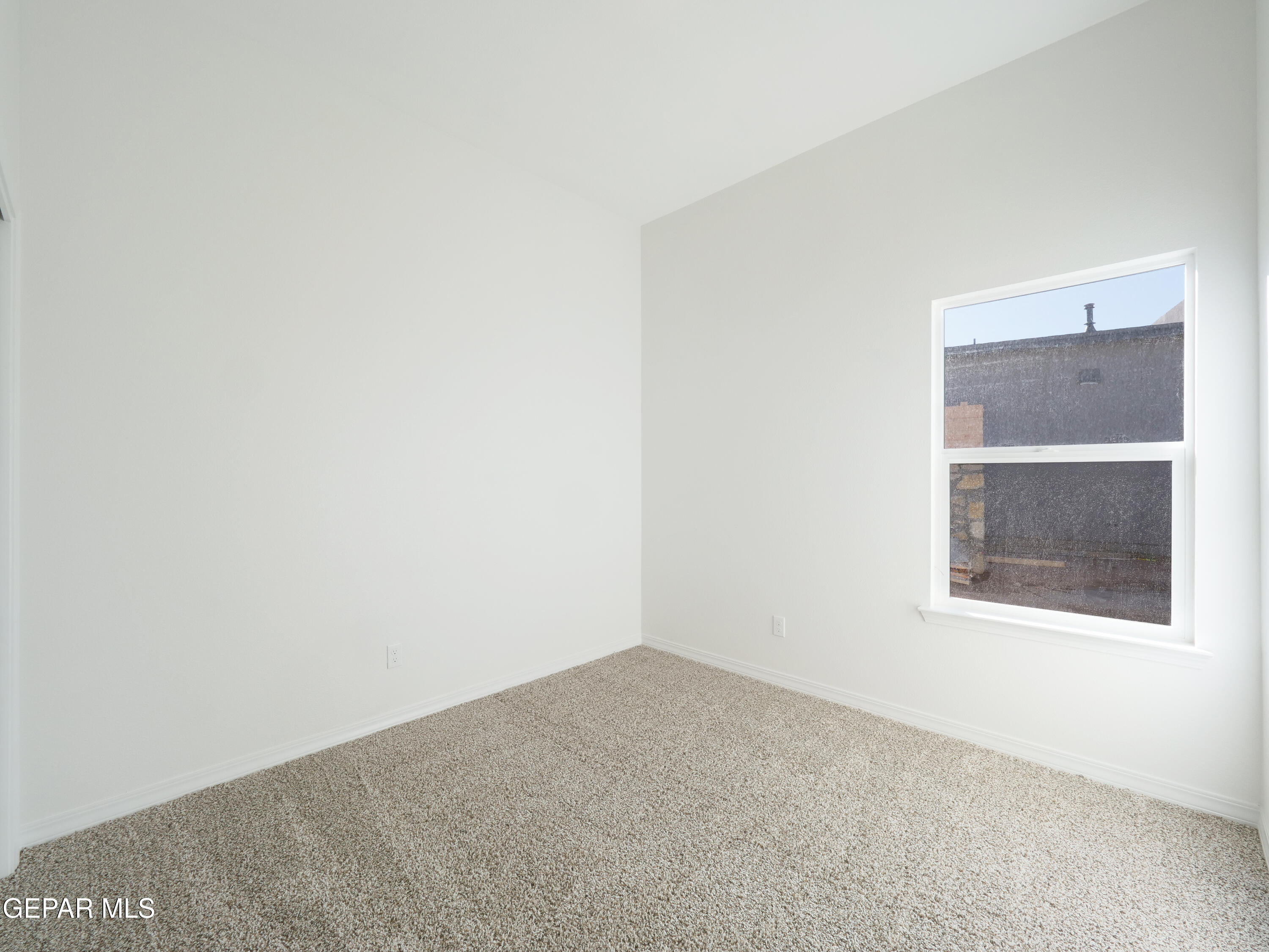 6041 Summer Ridge Santa Teresa, NM 88008 - Photo 13 of 13 a view of an empty room with a window