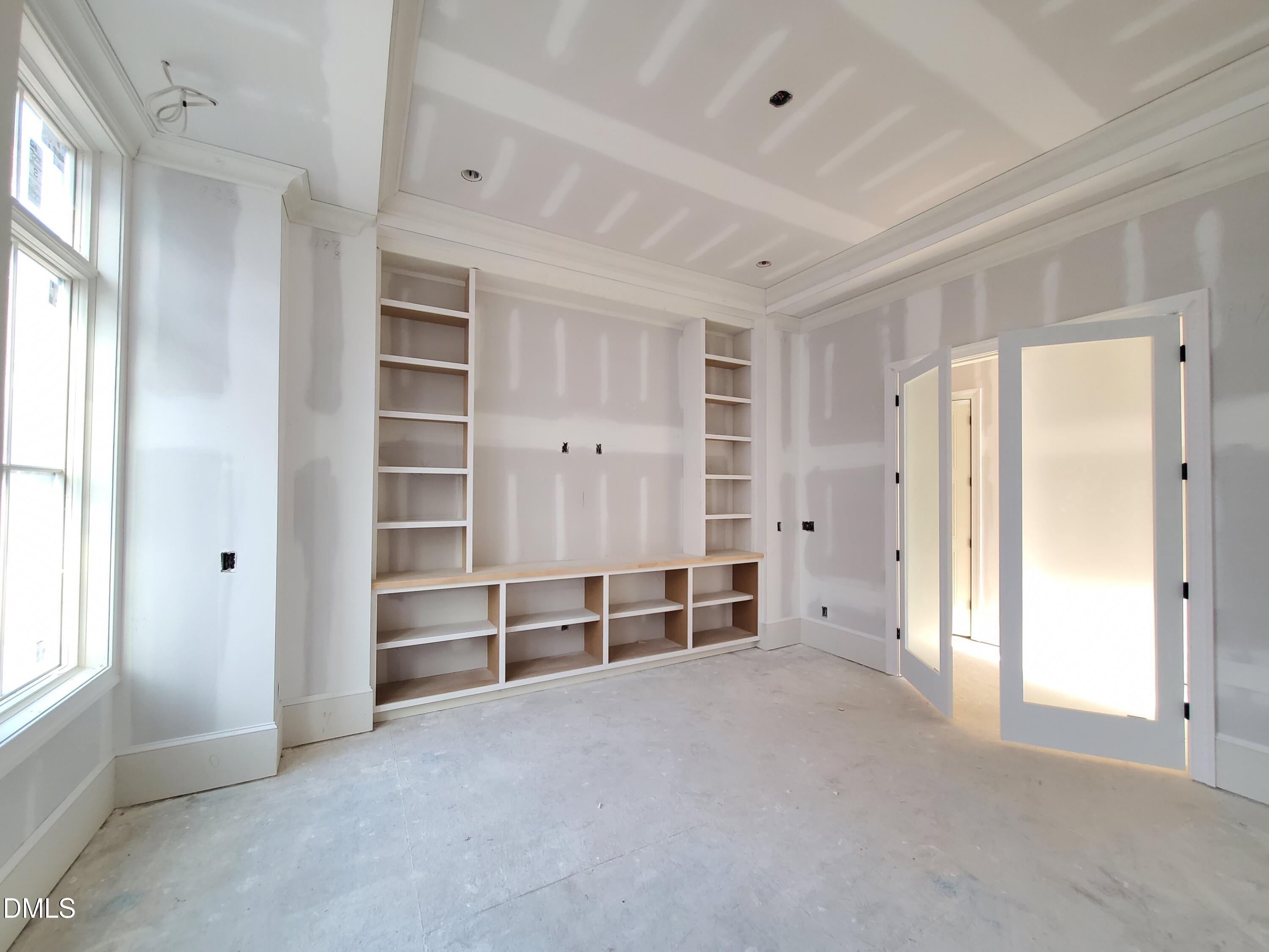 6508 Sanctuary Falls Drive Raleigh, NC 27614 - Photo 13 of 41 an empty room with windows and closet