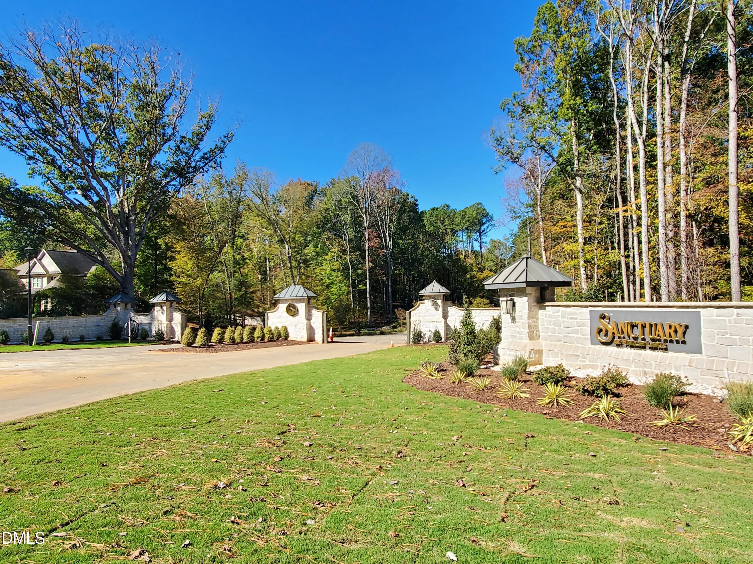 6508 Sanctuary Falls Drive Raleigh, NC 27614 - Photo 5 of 41 a view of a park with large trees