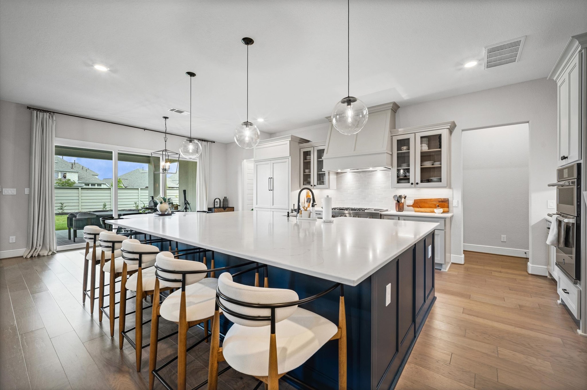 4923 Grapevine Lane Manvel, TX 77578 - Photo 9 of 49 a large kitchen with a table and chairs