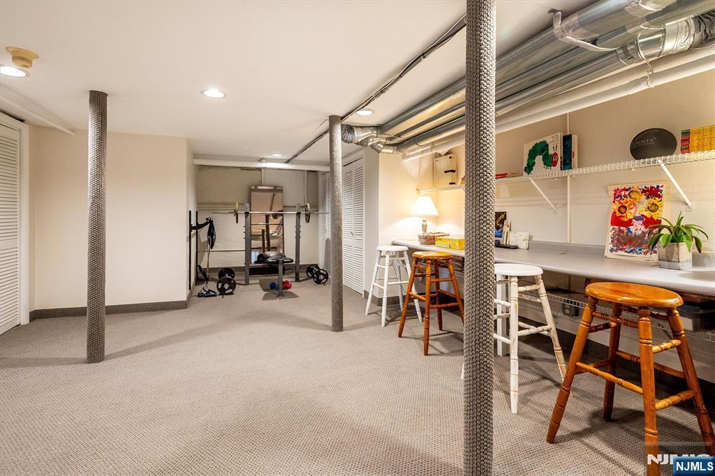 111 Montclair Avenue Montclair, NJ 07042 - Photo 39 of 46 a view of a livingroom with furniture and a window