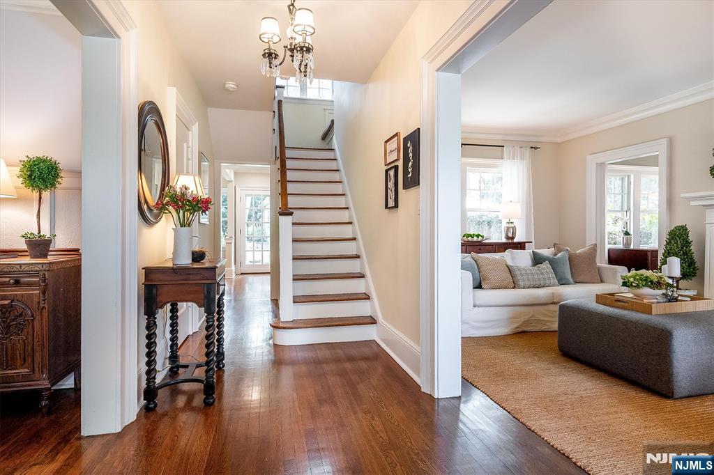 111 Montclair Avenue Montclair, NJ 07042 - Photo 4 of 46 a view of a living room and entryway with wooden floor