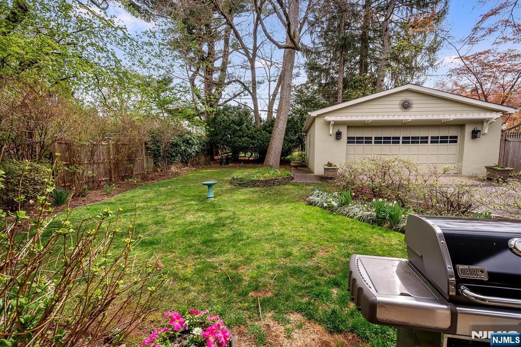 111 Montclair Avenue Montclair, NJ 07042 - Photo 42 of 46 a front view of a house with garden