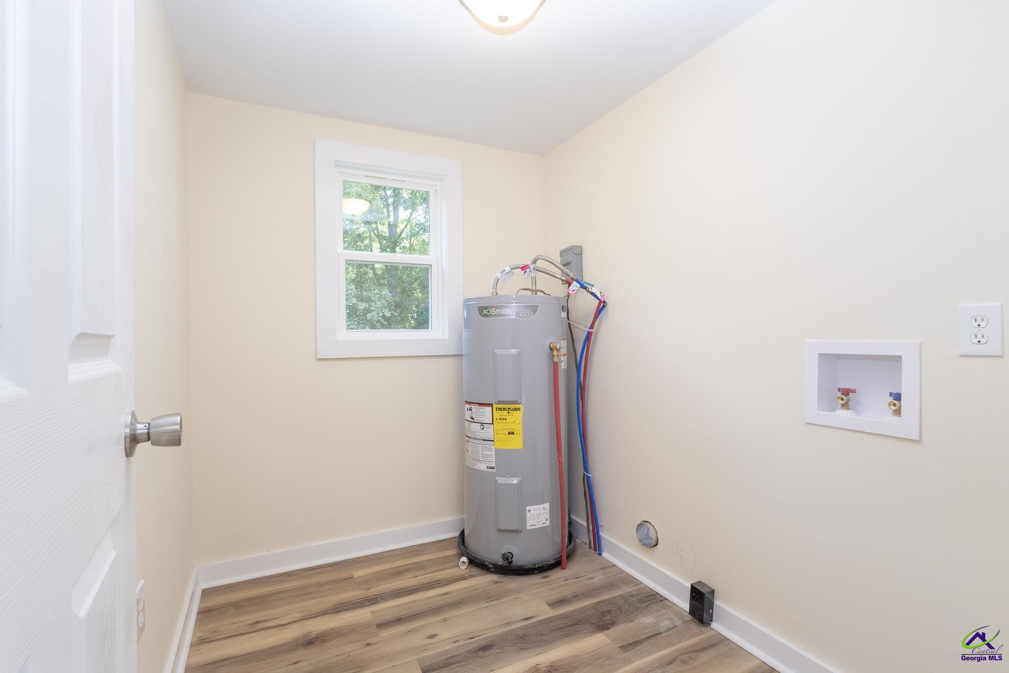 156 Churchwell Road Cochran, GA 31014 - Photo 18 of 20 a view of an entryway with wooden floor