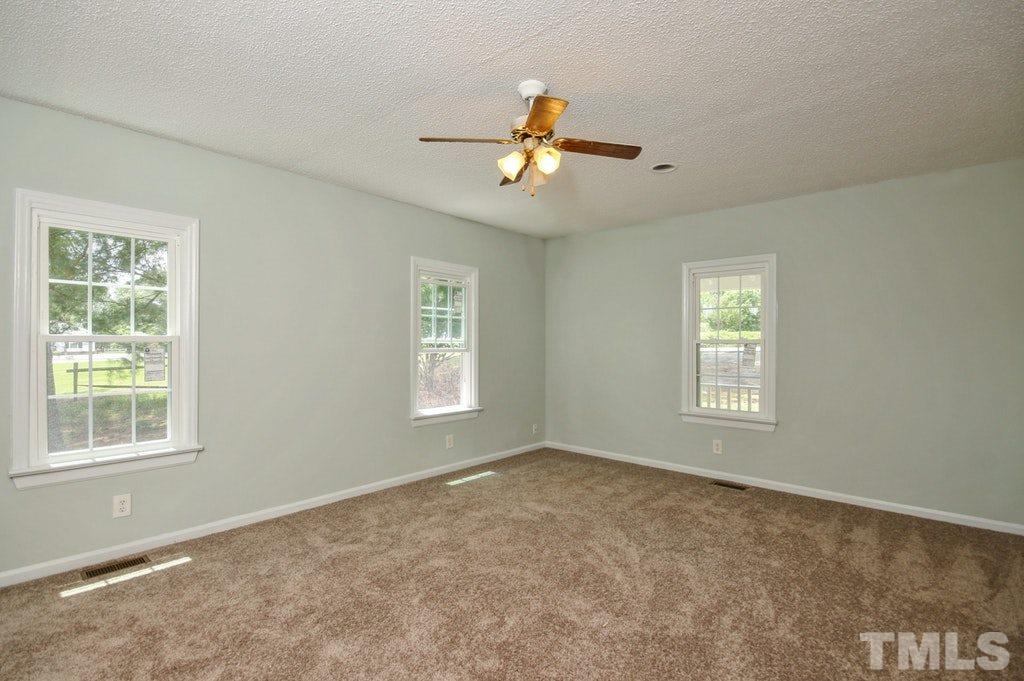 2959 Federal Road Benson, NC 27504 - Photo 8 of 20 a view of an empty room with a window