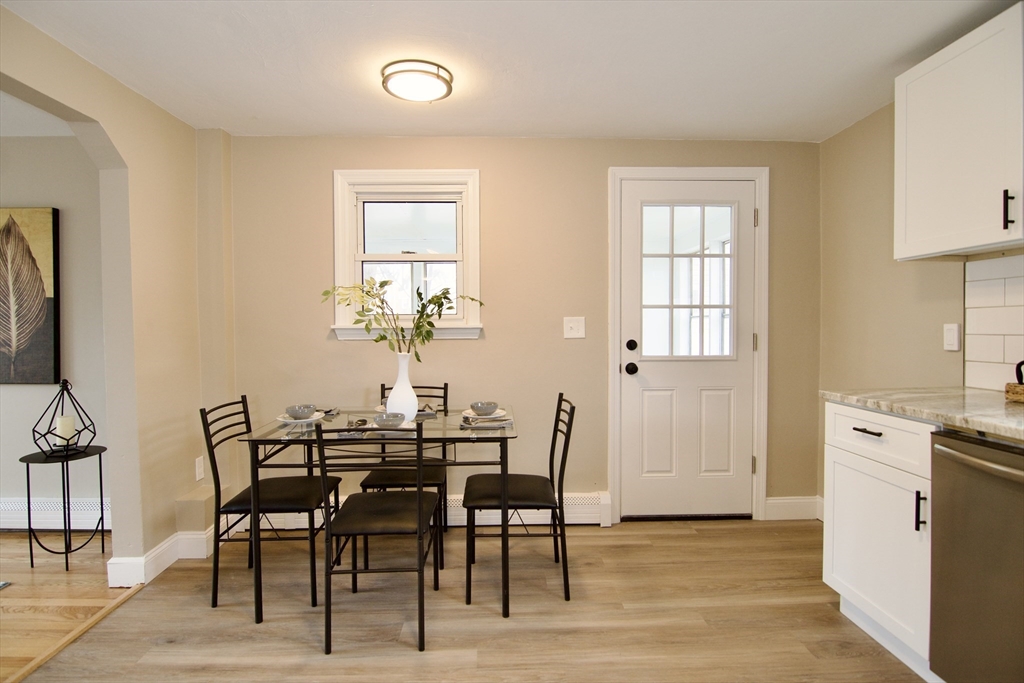 1295 Bay Street Springfield, MA 01109 - Photo 12 of 42 a view of a dining room with furniture and wooden floor