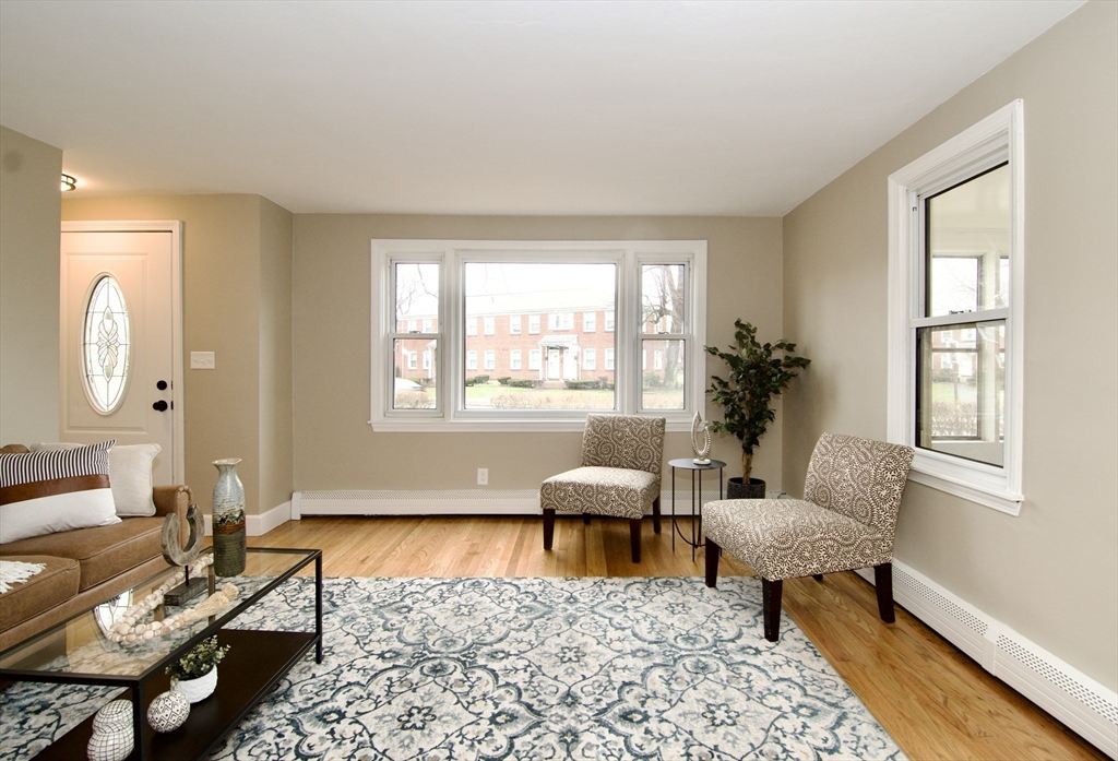 1295 Bay Street Springfield, MA 01109 - Photo 15 of 42 a living room with furniture and a window