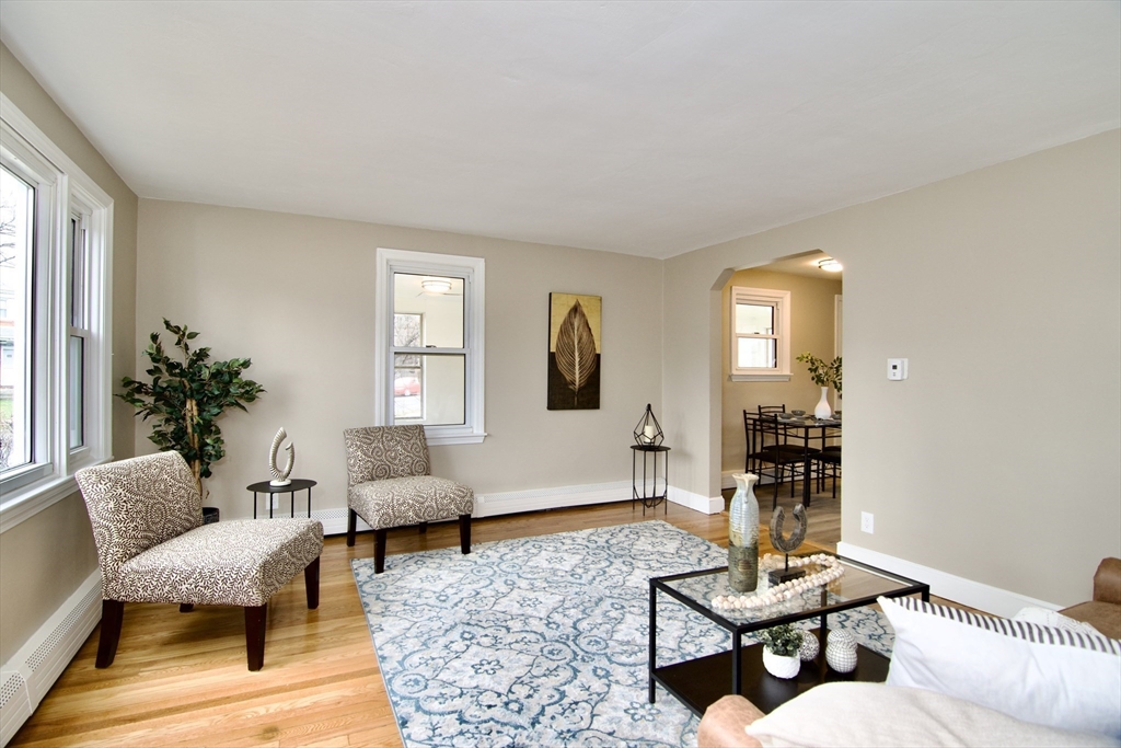 1295 Bay Street Springfield, MA 01109 - Photo 16 of 42 a living room with furniture and wooden floor