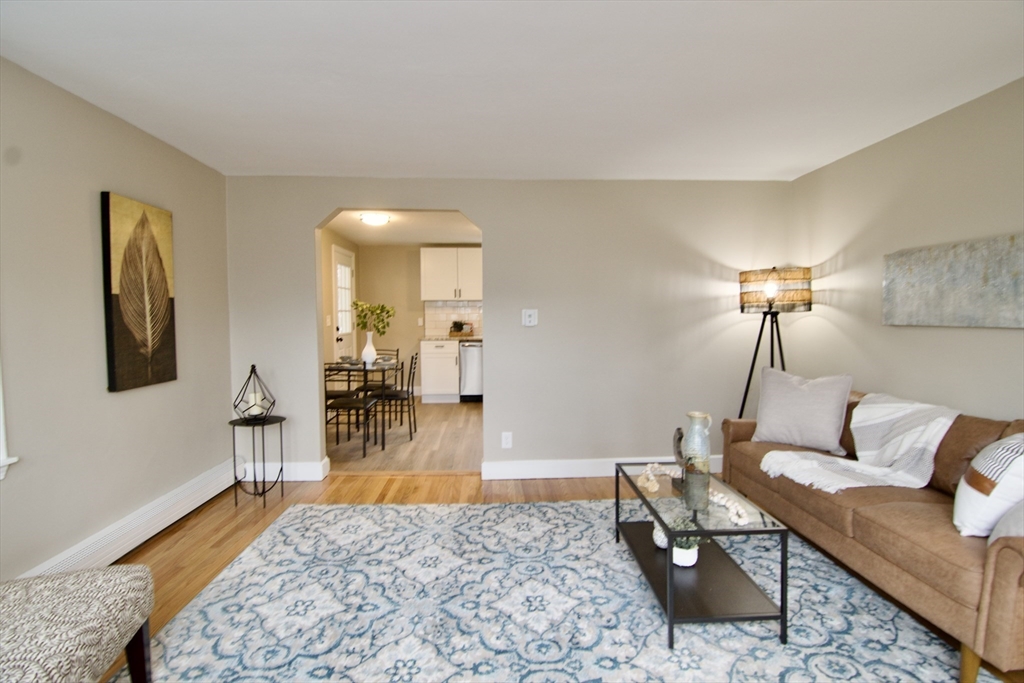 1295 Bay Street Springfield, MA 01109 - Photo 19 of 42 a living room with furniture and wooden floor
