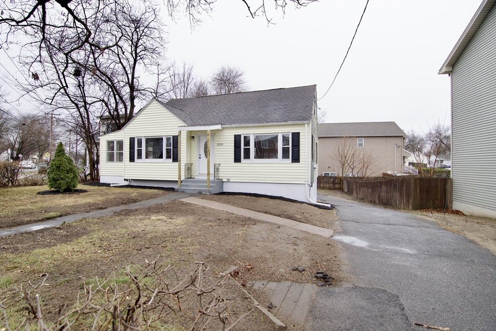 1295 Bay Street Springfield, MA 01109 - Photo 2 of 42 a view of a house with a yard