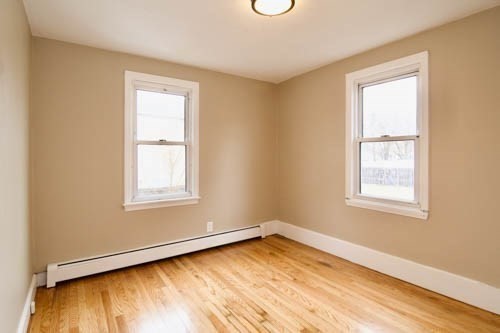 1295 Bay Street Springfield, MA 01109 - Photo 29 of 42 a view of an empty room with wooden floor and a window