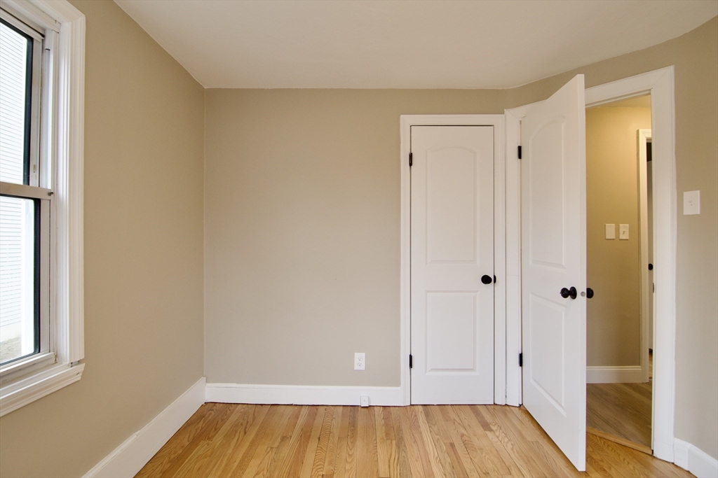 1295 Bay Street Springfield, MA 01109 - Photo 30 of 42 a view of a room with wooden floor and a window