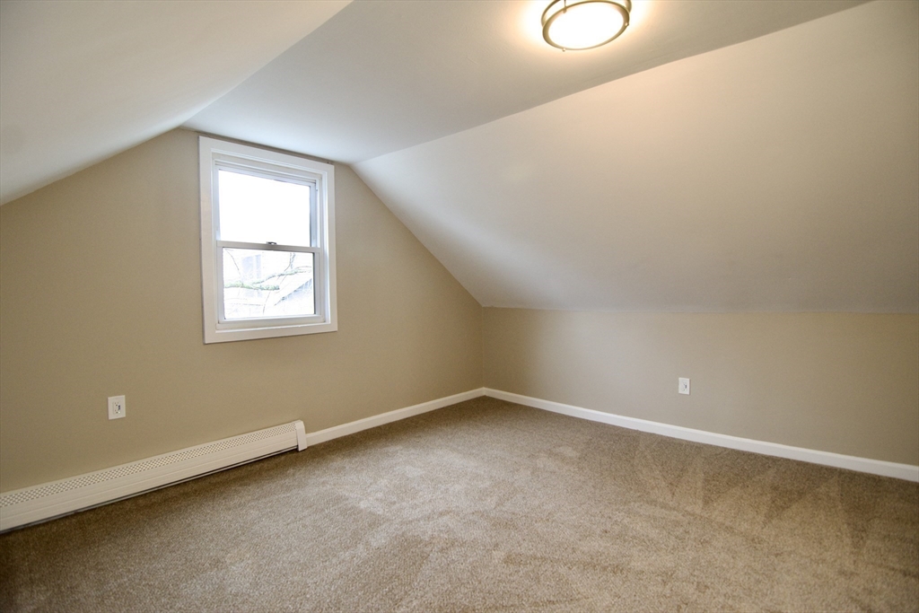 1295 Bay Street Springfield, MA 01109 - Photo 34 of 42 an empty room with a window