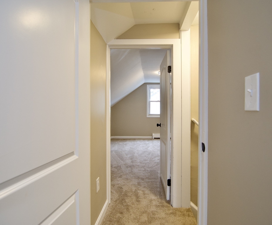 1295 Bay Street Springfield, MA 01109 - Photo 37 of 42 a view of a bathroom from a hallway