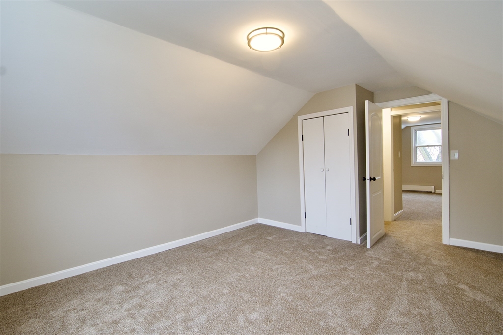 1295 Bay Street Springfield, MA 01109 - Photo 39 of 42 an empty room with closet area