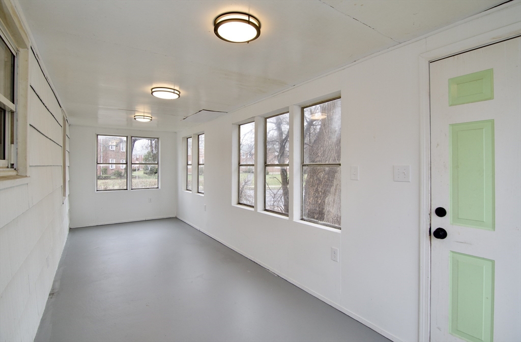 1295 Bay Street Springfield, MA 01109 - Photo 6 of 42 a view of an empty room and window