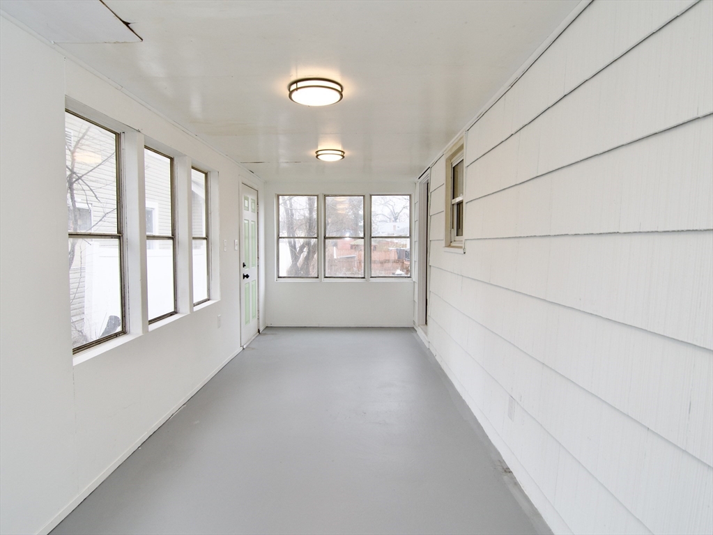 1295 Bay Street Springfield, MA 01109 - Photo 7 of 42 an empty room with windows