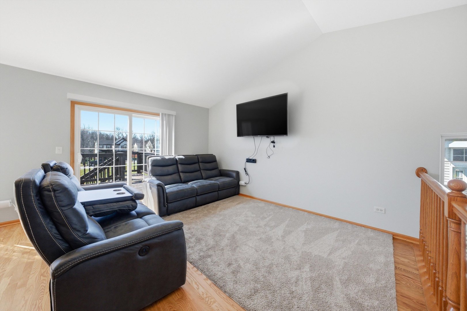 2450 Saddle Ridge Drive Joliet, IL 60432 - Photo 13 of 31 a living room with furniture and a flat screen tv