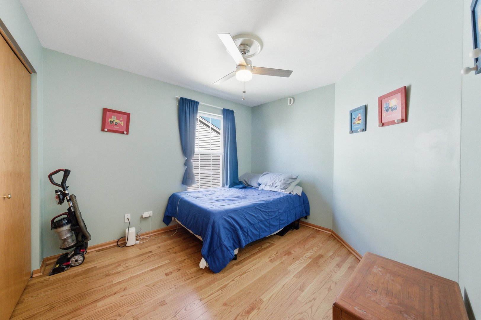 2450 Saddle Ridge Drive Joliet, IL 60432 - Photo 17 of 31 a living room with a bed furniture and a window