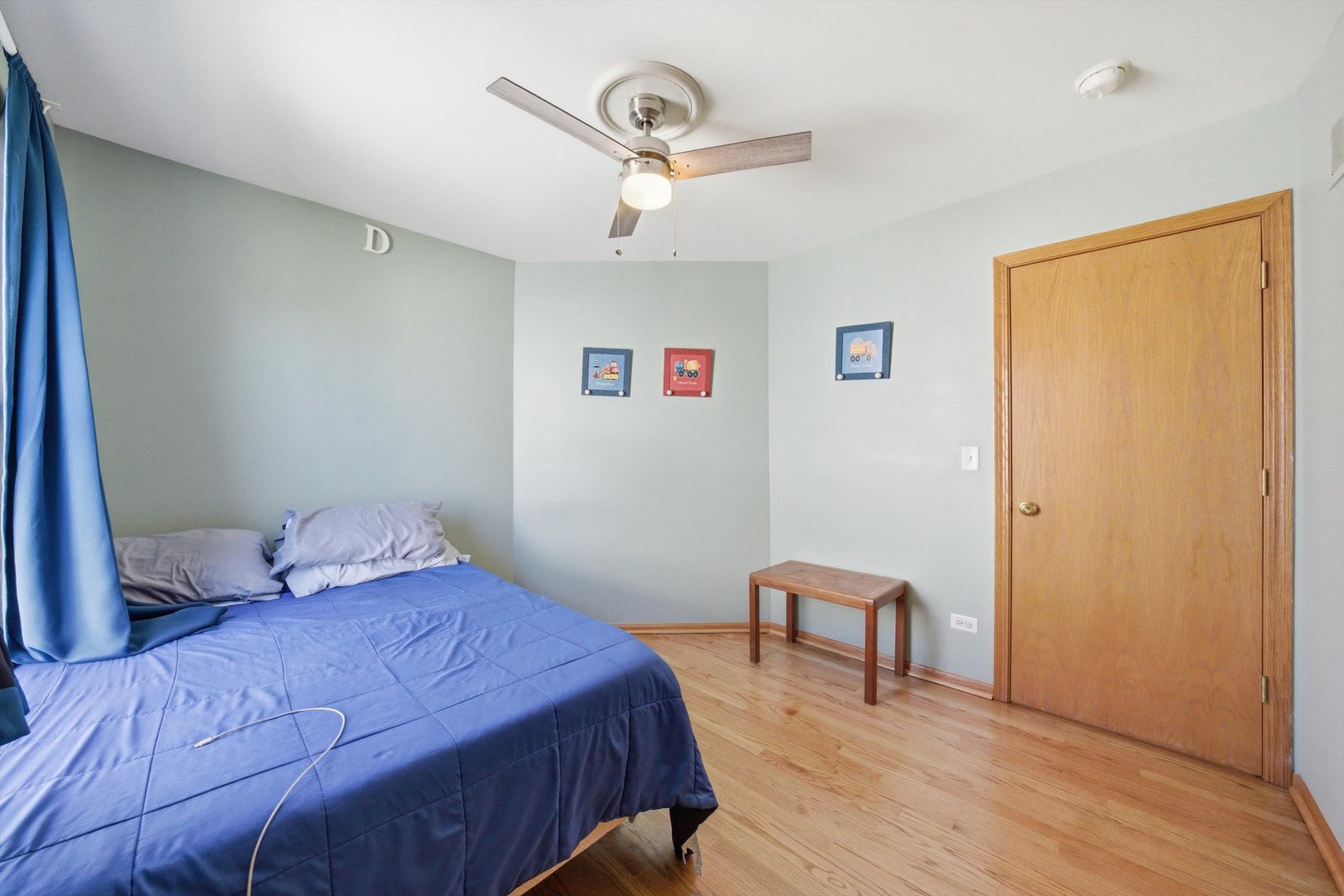 2450 Saddle Ridge Drive Joliet, IL 60432 - Photo 18 of 31 a bedroom with a bed and a chair