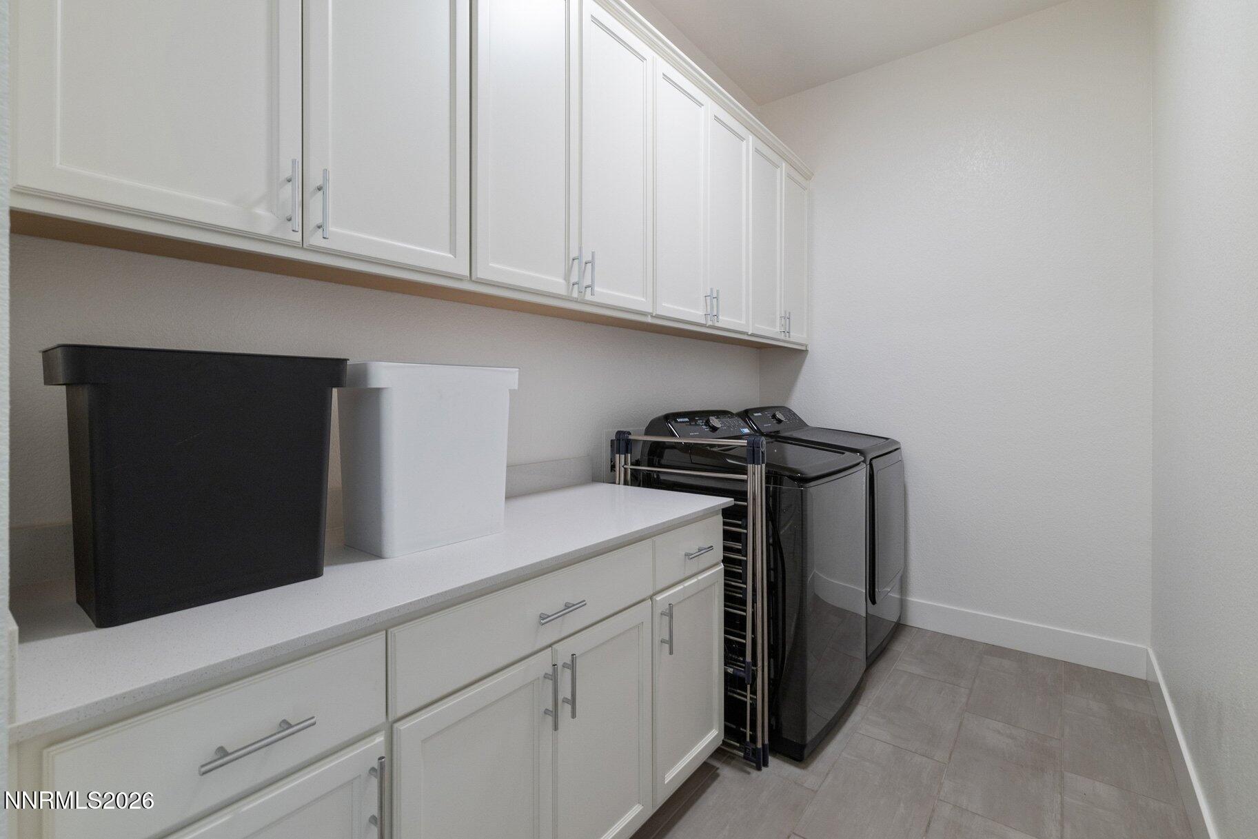 911 Solarium Drive Reno, NV 89511 - Photo 15 of 37 a kitchen with a sink and cabinets