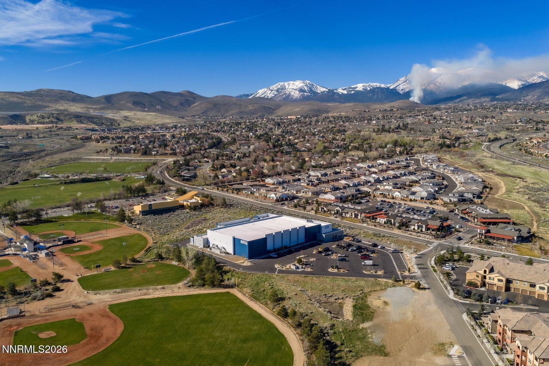 911 Solarium Drive Reno, NV 89511 - Photo 18 of 37 an aerial view of residential houses with outdoor space