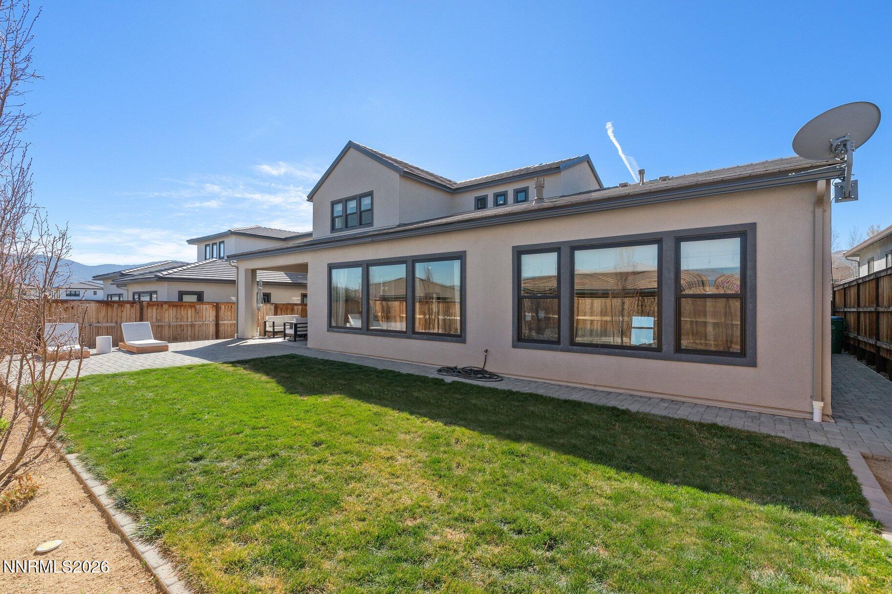 911 Solarium Drive Reno, NV 89511 - Photo 30 of 37 a front view of a house with garden