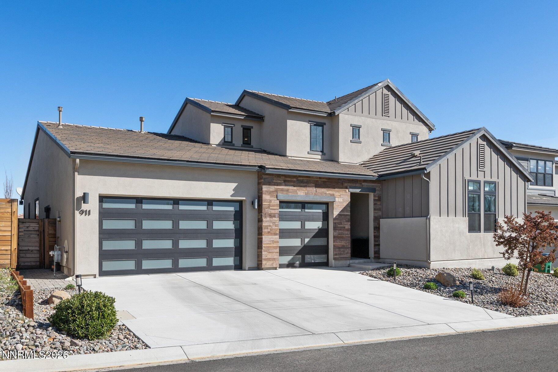 911 Solarium Drive Reno, NV 89511 - Photo 34 of 37 a view of a house with entrance and parking