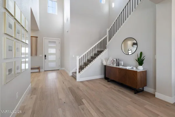 a view of entryway with wooden floor