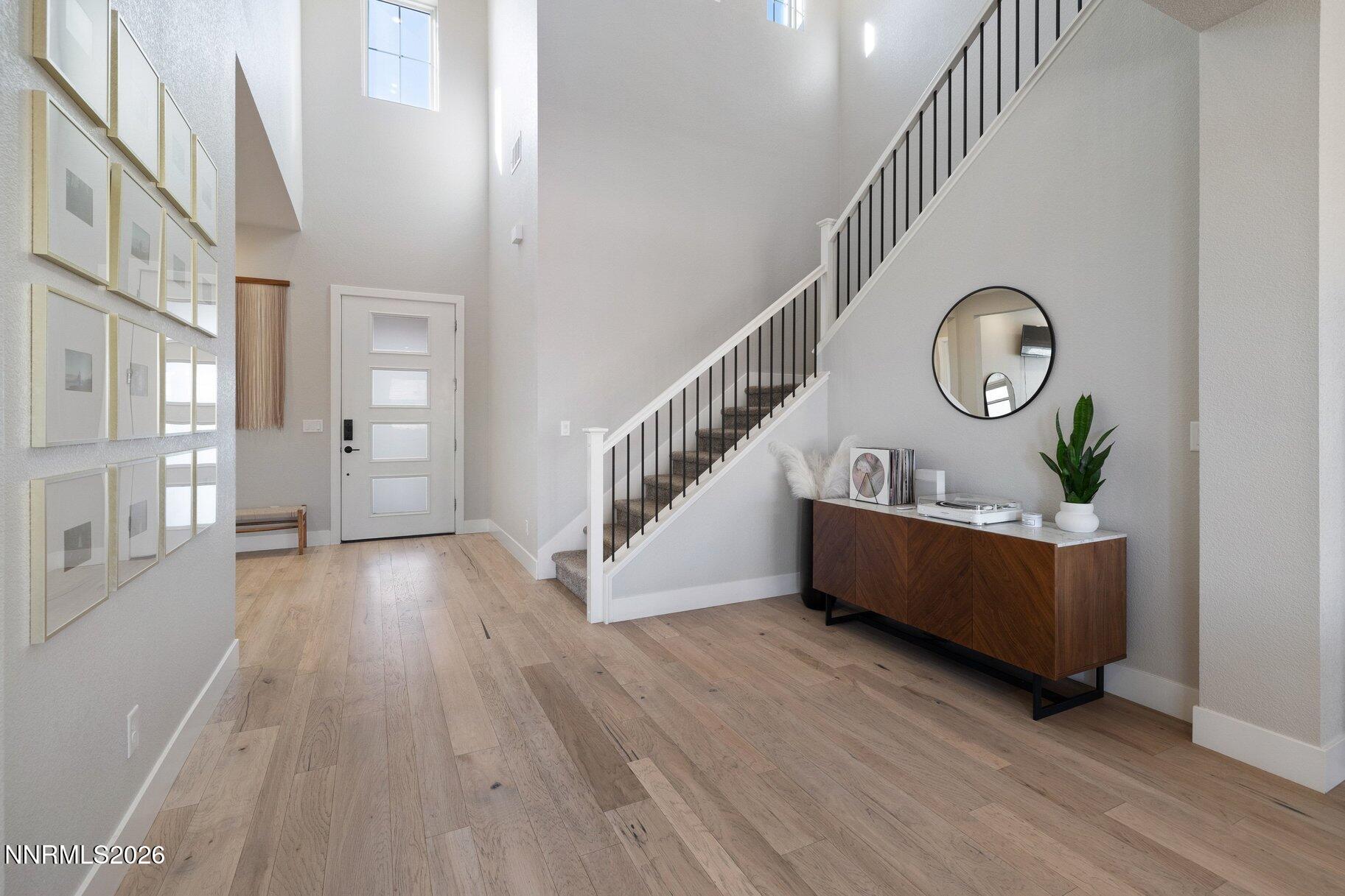 911 Solarium Drive Reno, NV 89511 - Photo 4 of 37 a view of entryway with wooden floor