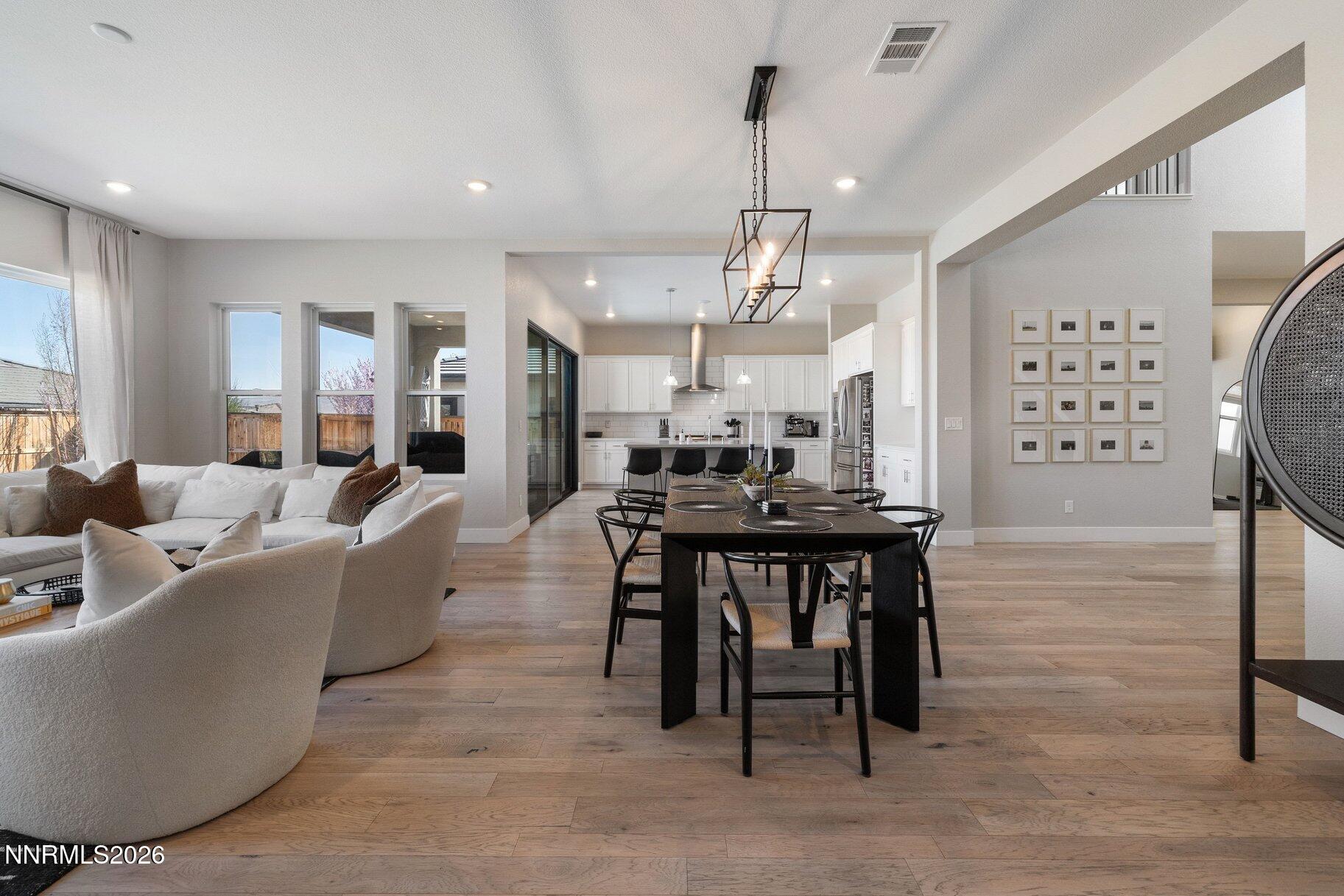 911 Solarium Drive Reno, NV 89511 - Photo 9 of 37 a large kitchen with a table and chairs