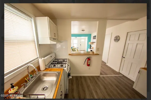 a view of a living room with a window
