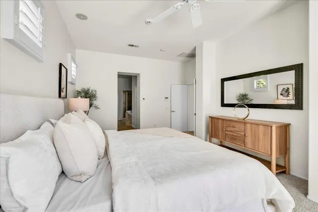 a view of a city with lawn chairs