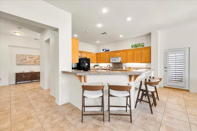 a bathroom with a sink toilet and a mirror