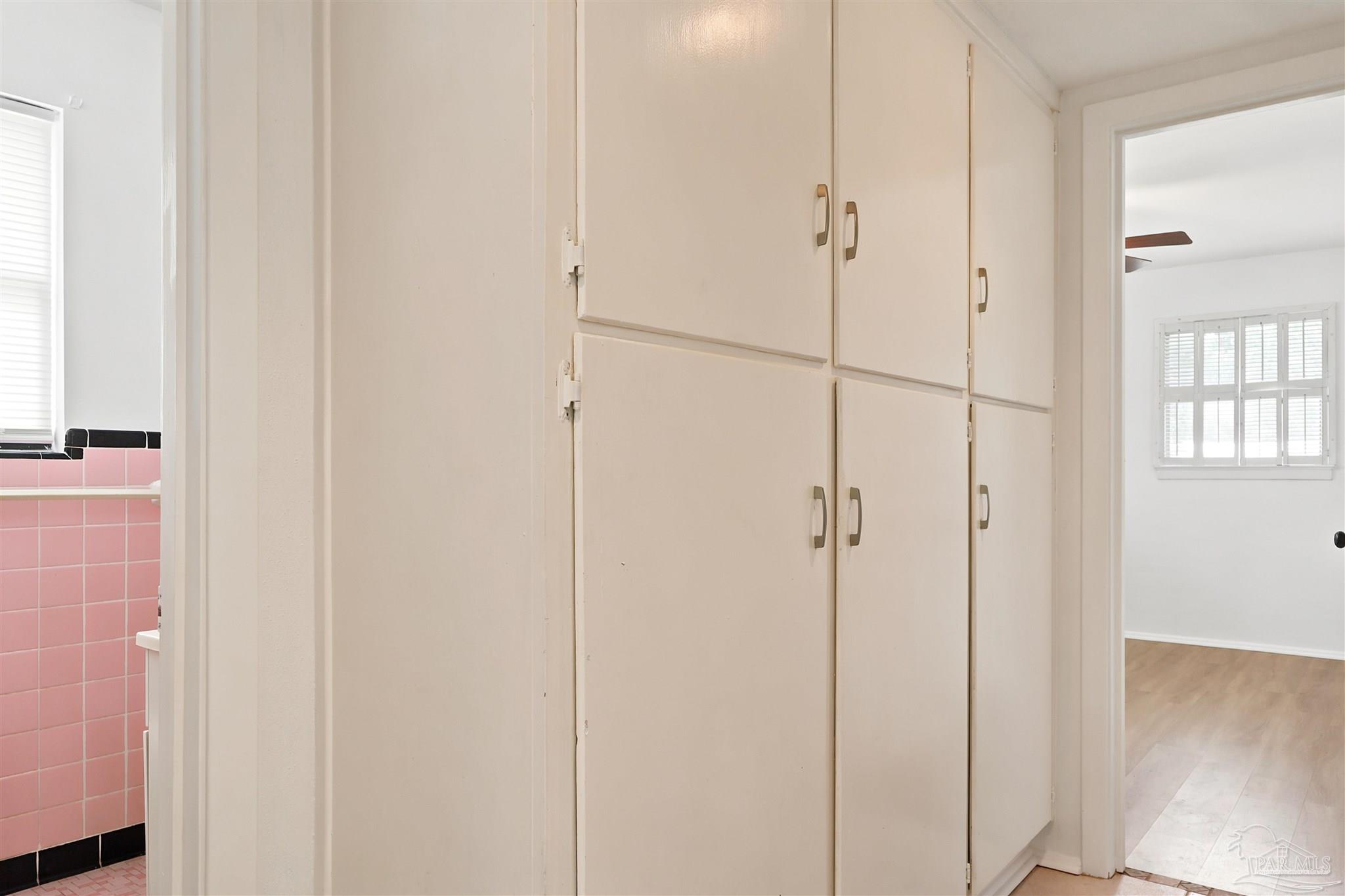 101 Vanderbilt Road Pensacola, FL 32506 - Photo 30 of 33 Built-in hallway storage cabinet