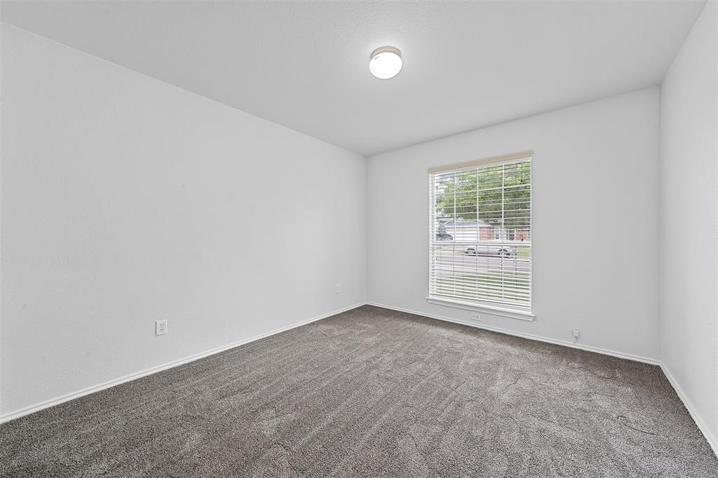 10120 Salem Way Waco, TX 76708 - Photo 10 of 19 an empty room with windows