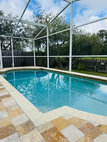 a view of a garden with a small pool