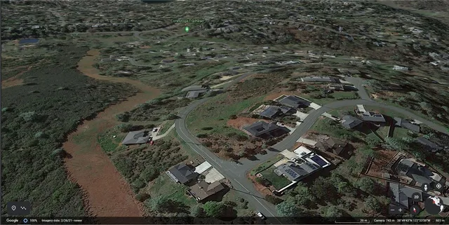 an aerial view of residential house with outdoor space