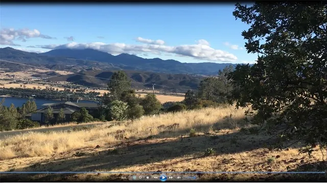 a view of a lake with a mountain