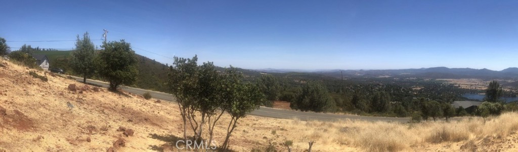 15965 Eagle Rock Road Hidden Valley Lake, CA 95467 - Photo 29 of 35 a view of a yard covered with snow