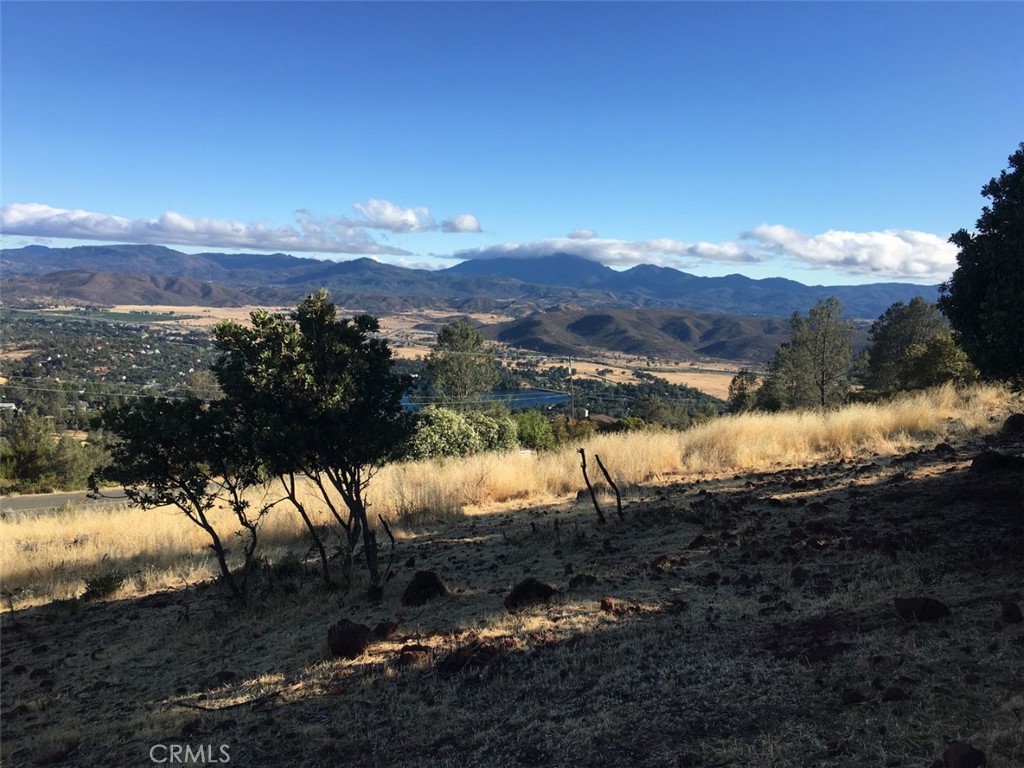15965 Eagle Rock Road Hidden Valley Lake, CA 95467 - Photo 31 of 35 a view of a lake with a mountain