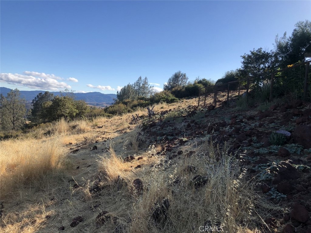 15965 Eagle Rock Road Hidden Valley Lake, CA 95467 - Photo 33 of 35 a view of a lake with a mountain