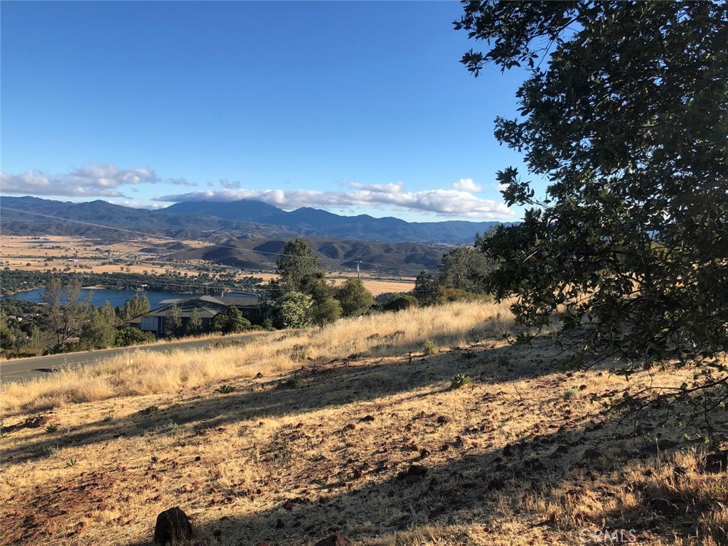 15965 Eagle Rock Road Hidden Valley Lake, CA 95467 - Photo 34 of 35 a view of a yard with mountains in the background